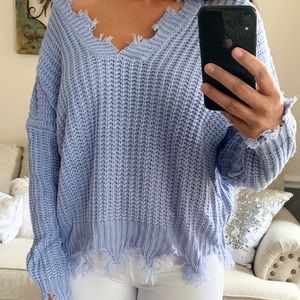 Distressed sweater
